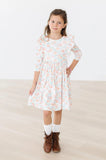 PRETTY PUMPKINS RUFFLE TWIRL DRESS