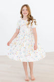 WATERCOLOR RAINBOWS SHORT SLEEVE POCKET TWIRL DRESS